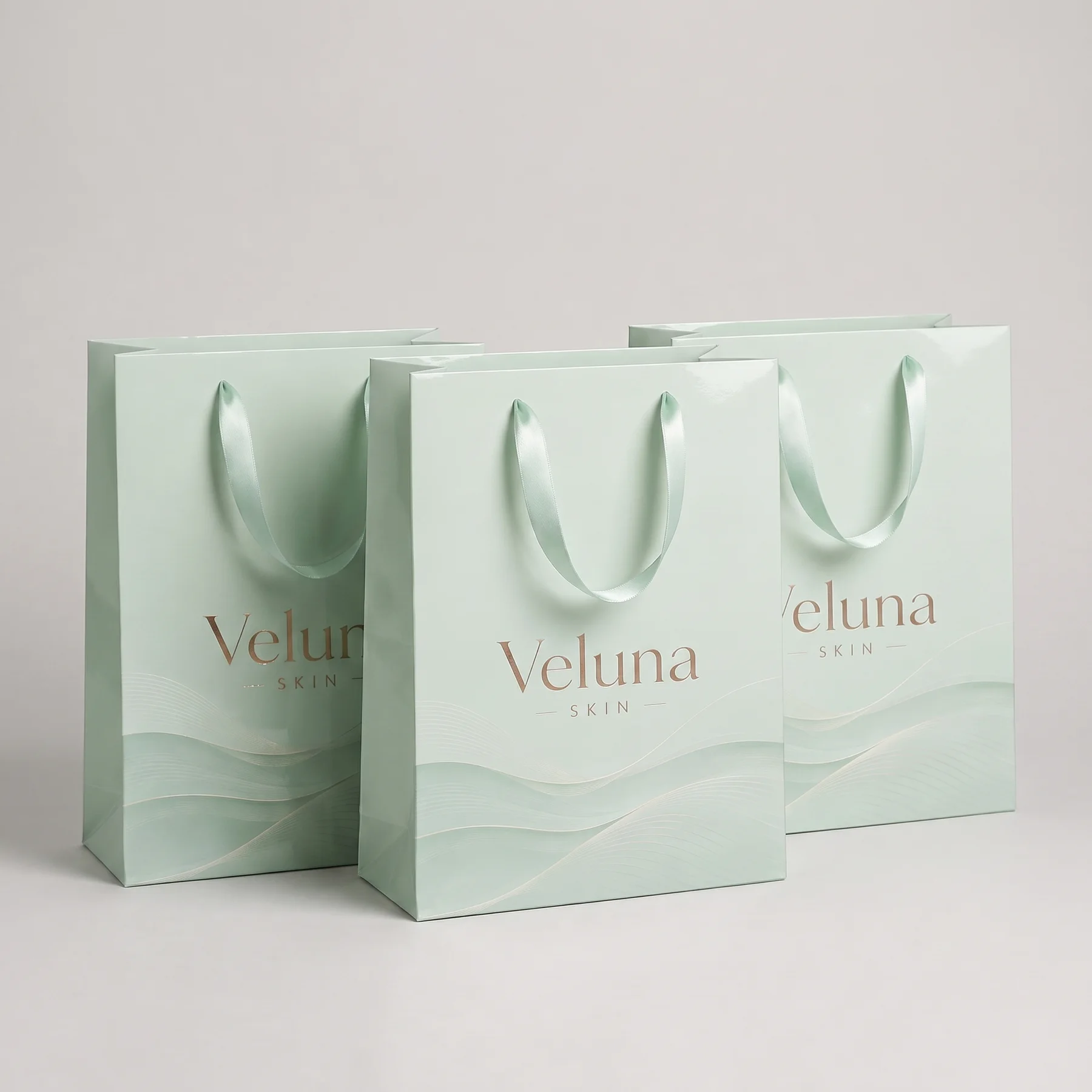 Фронтальный вид линейки мятных пакетов Veluna Skin